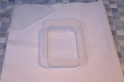 container on waterproof mat