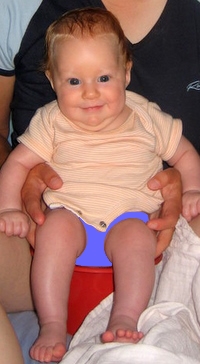 11 weeks - in-arms hold on potty